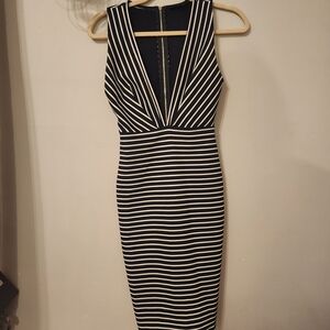 Olivaceous Black and White Striped Midi Dress